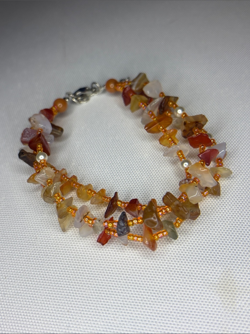 Carnelian and agate chip seed bead orange bracelet
